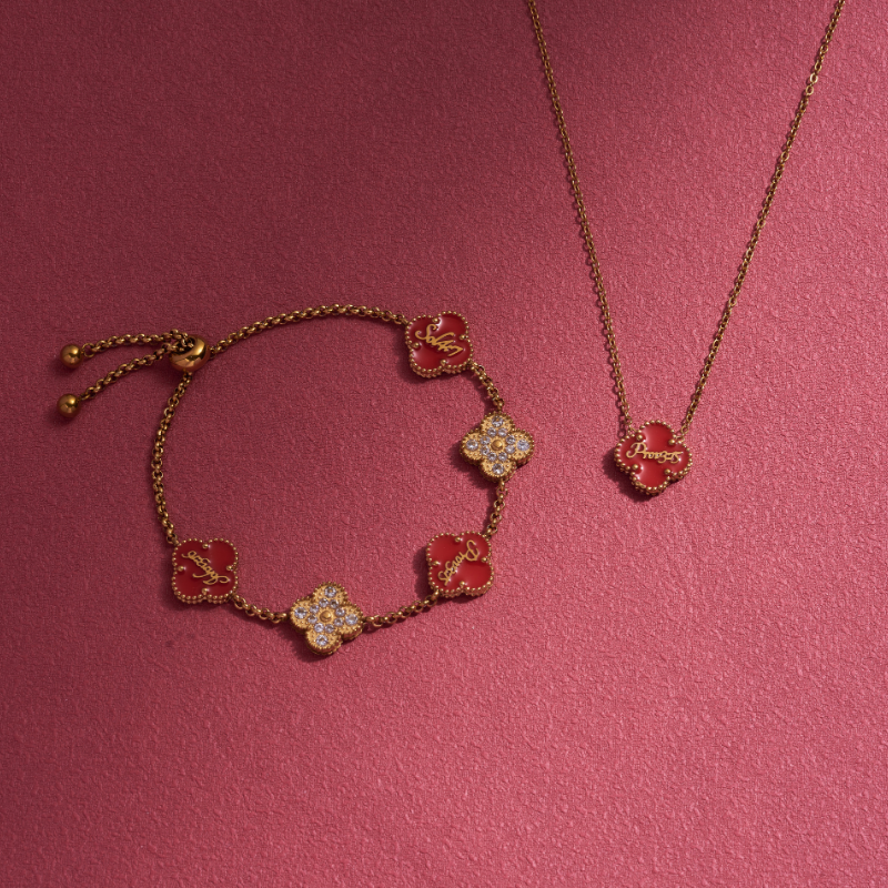 Bible-versed Valentine clover necklace and bracelet bundle in gold, featuring pink and red Christian jewellery engraved with Scripture

